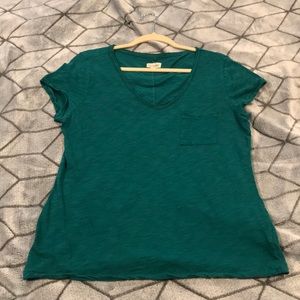 Green V-neck worh pocket by Maison Jules